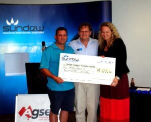 David Priddy (center) C.E.O. Sundew Solutions presenting the cheque for $4,600 to Starlight Charity 