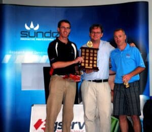David Priddy (center) C.E.O. presenting the Sundew Charity Golf Day trophy